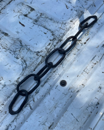 Decorative wrought iron gate hinge